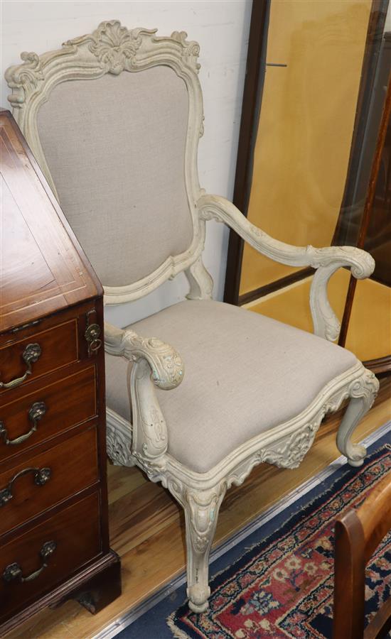 A pair of Louis XIV style large cream painted upholstered elbow chairs